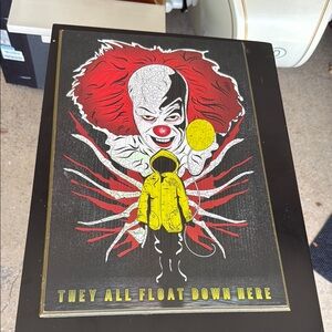 Horror-Themed Wall Art with Red and Yellow Accents